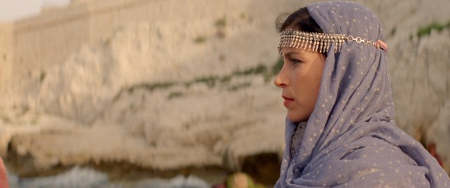 Still from Volume 3: The Enchanted One, Scheherazade (on the 515th day of narrating stories to the King)