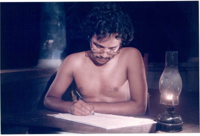 Kathapurushan - Kunjunnii writing (lamp before)